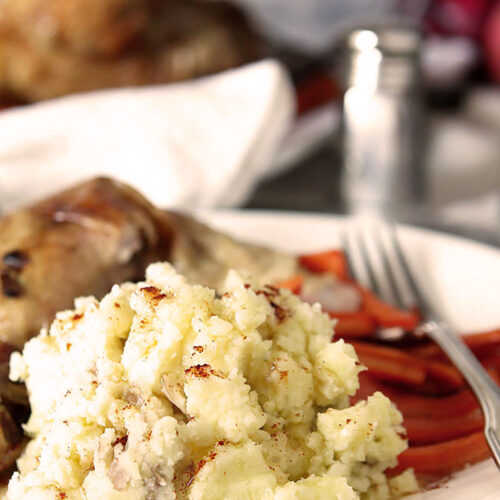 Smashed Potatoes with Garlic and Fine Herbs Cheese Served with Roast Checken and Carrots