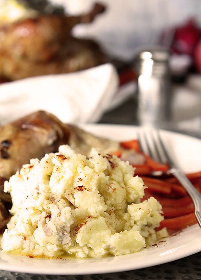 Smashed Potatoes with Garlic and Fine Herbs Cheese Served with Roast Checken and Carrots