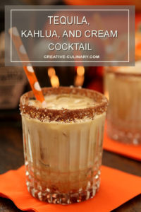 Tequila, Kahlua, and Cream Cocktail in a Highball Glass with an Orange Straw