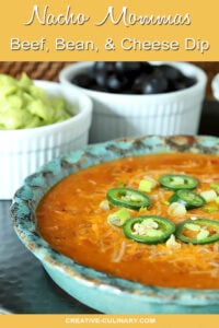 Nacho Mommas Beef, Bean, and Cheese Tortilla Dip Garnished with Jalapeno Slices