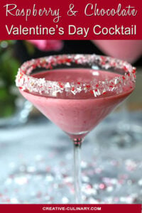 Raspberry and Chocolate Valentine Cocktail in a Martini Glass with Clear, White and Red Sugars on Rim