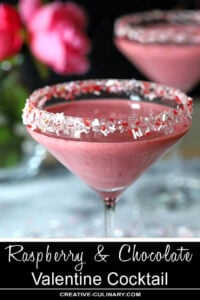 Raspberry and Chocolate Valentine Cocktail in a Martini Glass with Clear, White and Red Sugars on Rim