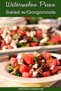 Watermelon Pecan Salad with Gorgonzola Cheese Served on a Round White Plate