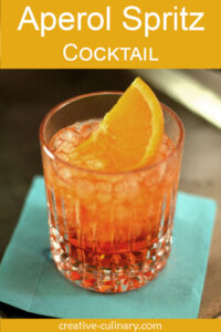 Closeup of Aperol Spritz with Orange Slice Garnish