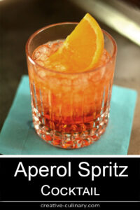 Closeup of Aperol Spritz with Orange Slice Garnish