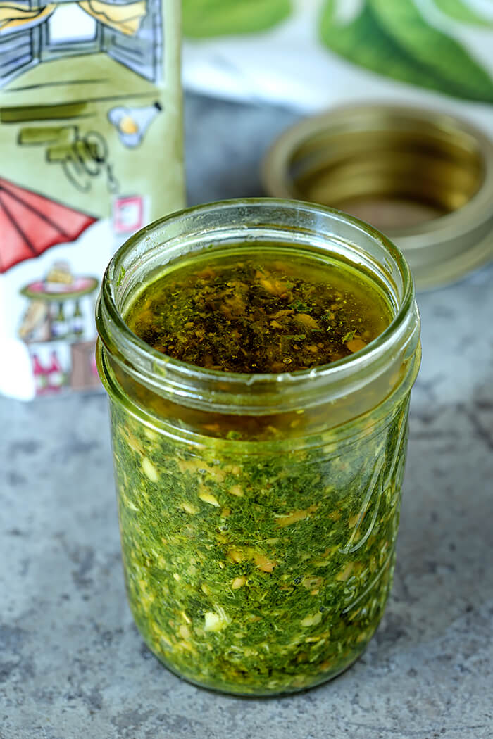 Traditional Italian Basil Pesto with Pine Nuts in a Small Canning Jar