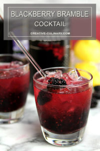 Blackberry Bramble Cocktail in Lowball Glasses Garnished with Blackberries