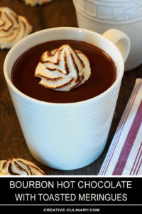 Bourbon Hot Chocolate with Toasted Meringue in a White Pottery Cup