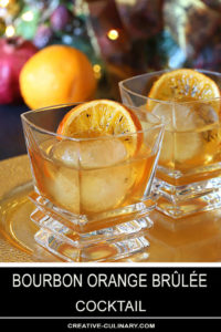 Two Bourbon Orange Brûlée Cocktails on Gold Serving Tray