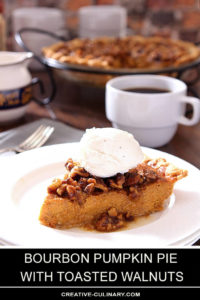 Slice of Bourbon Pumpkin Pie with Toasted Walnuts Topped with Whipped Cream