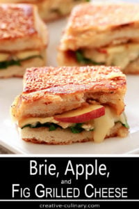 Bried, Apple, and Fig Grilled Cheese Sandwiches On Serving Plate