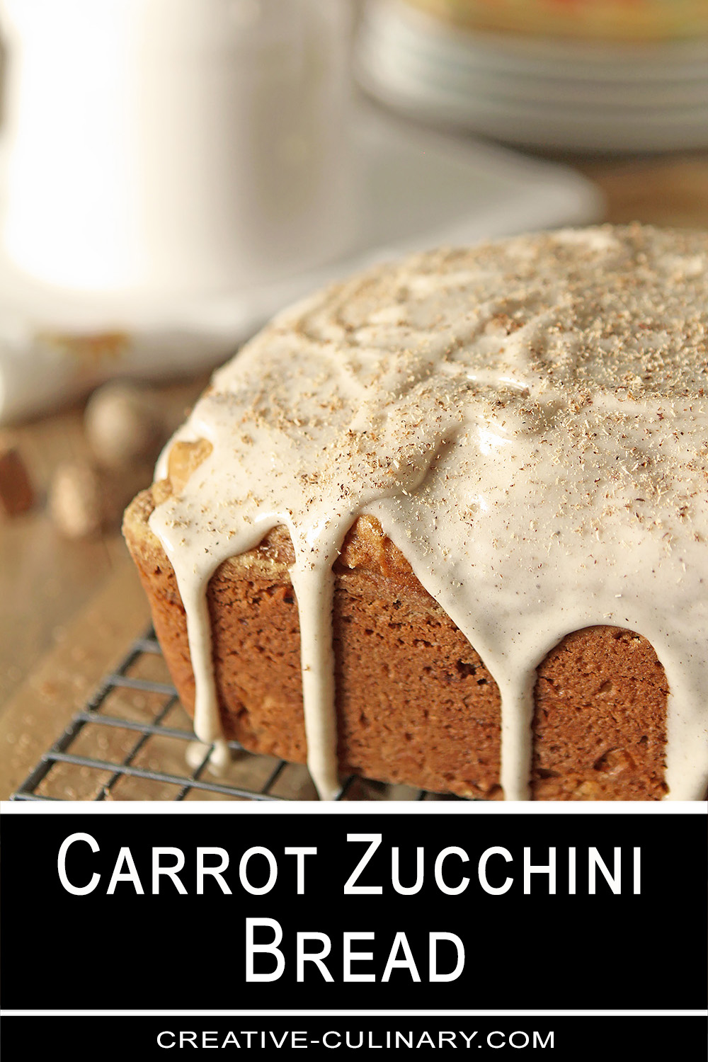 Carrot Zucchini Bread is a lovely quick bread with grated zucchini and carrot; all topped with a cream cheese glaze.