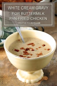 White Gravy from Old Fashioned Pan Fried Chicken Drippings in a Yellow Serving Bowl