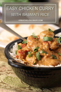 Closeup of This Easy Chicken Curry is Served in a Black Bowl and Garnished with Parsley