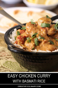 Closeup of This Easy Chicken Curry is Served in a Black Bowl and Garnished with Parsley