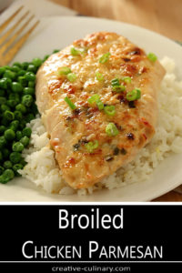 Closeup of Broiled Chicken Parmesan Over Rice