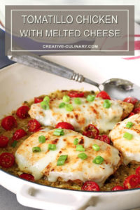 Tomatillo Salsa Verde Chicken Breasts in a Skillet with Cherry Tomatoes