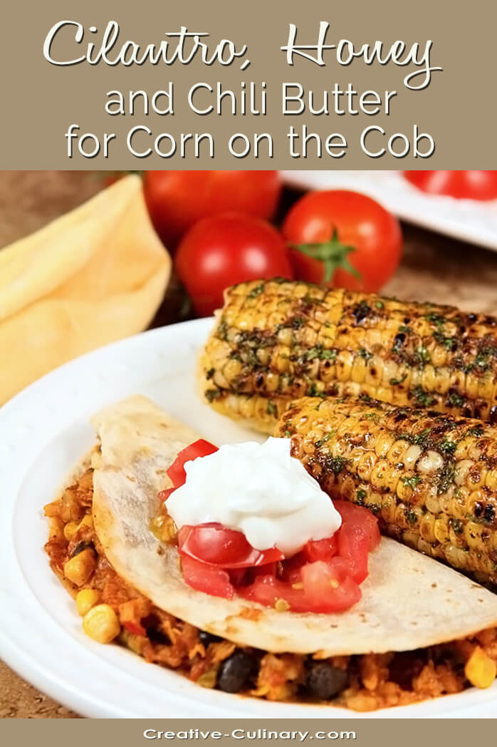 Cilantro, Honey, and Chile Corn on the Cob Served with a Warm Taco on a White Plate