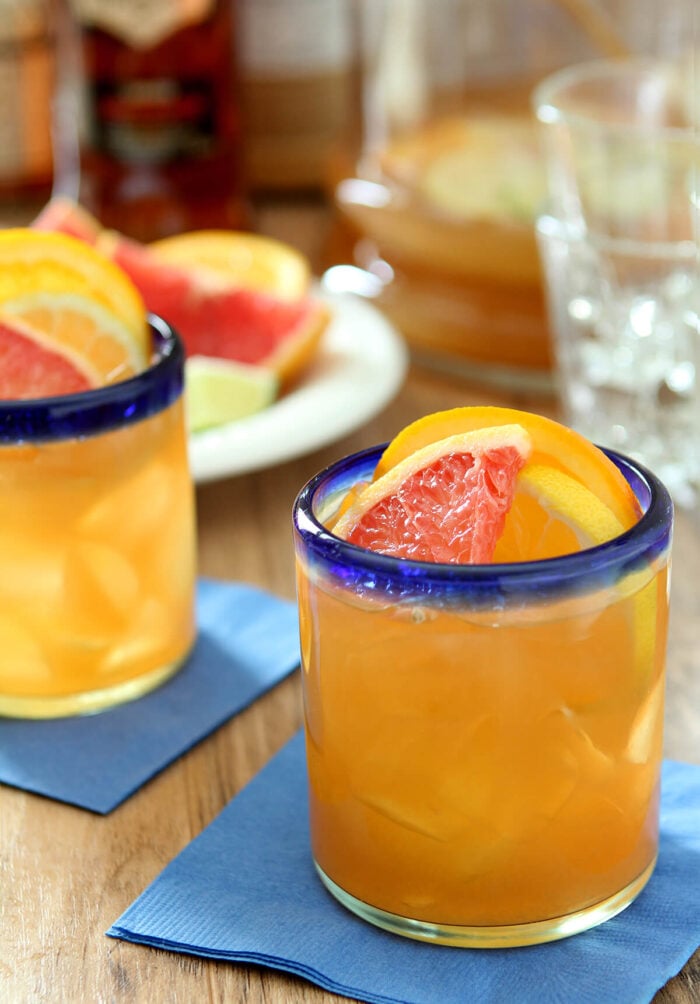 Citrus Rum Punch in Glasses with Blue Rim