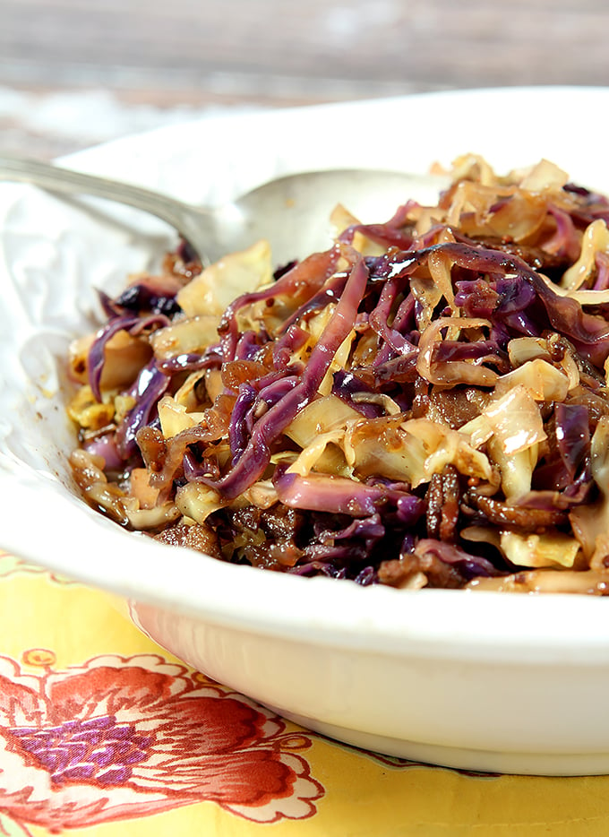 Coleslaw with Warm Bacon Dressing Served in a White Bowl