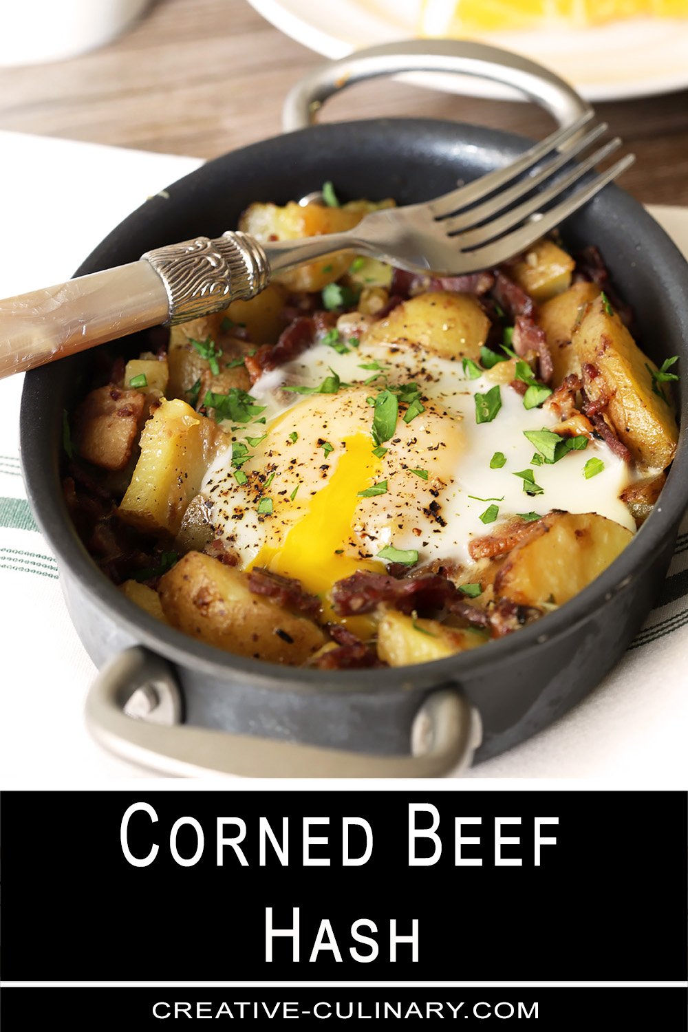 Corned Beef Hash with Bacon is Served in a Small Skillet.