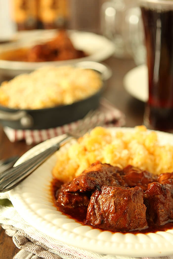 Country Pork Ribs with Bacon and Bourbon BBQ Sauce served with mac and cheese.