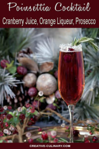 Beautiful Cranberry Pointsetta Cocktail Garnished with Rosemary and Cranberries