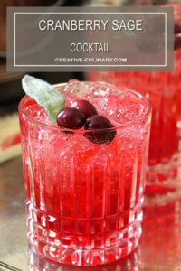 Cranberry Sage Cocktail with Cranberries and Sage Leaf Garnish