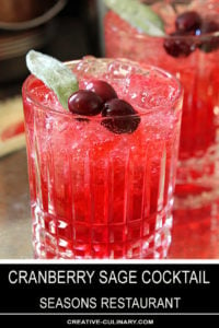 Cranberry Sage Cocktail with Cranberries and Sage Leaf Garnish