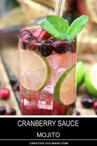 Cranberry Sauce Mojito Cocktails Garnished with Cranberries and Mint