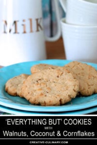 Everything But the Kitchen Sink Cookies with Walnuts, Coconut and Cornflakes on a Turquoise Plate