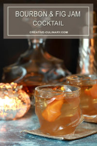 Bourbon and Fig Cocktail with Orange Liqueur, Honey and Lemon in a Lowball Glass with Orange Peel