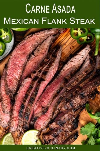 Carne Asada Flank Steak, sliced, on a cutting board.