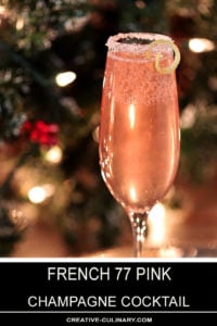 French 77 Pink Champagne Cocktail Garnished with Lemon Peel