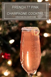 French 77 Pink Champagne Cocktail Garnished with a Sugar Rim and Lemon Peel