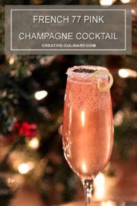 French 77 Pink Champagne Cocktail Garnished with Lemon Peel