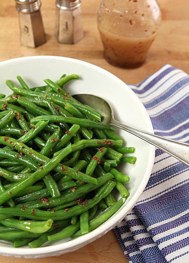 Green Beans with a Honey Mustard Vinaigrette in a White Serving Bowl