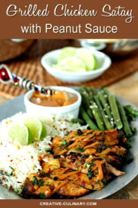 Grilled Chicken Thighs with Peanut Sauce on Plate with Green Beans and Rice