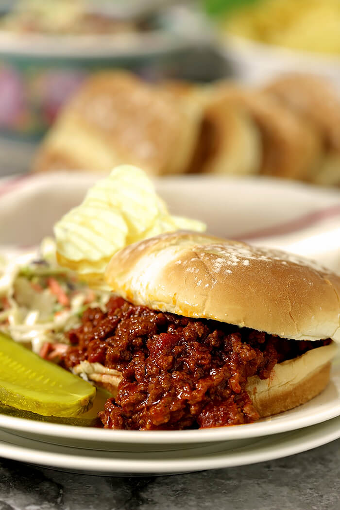 Sloppy Joe Sandwich with Pickle and Chips