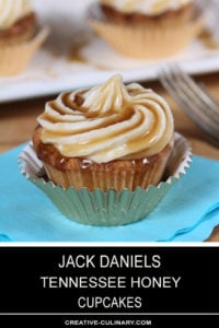 Closeup of Jack Daniels Honey Whiskey Cupcakes with a Boozy Drizzle from a Spoon In a Metallic Cupcake Liner