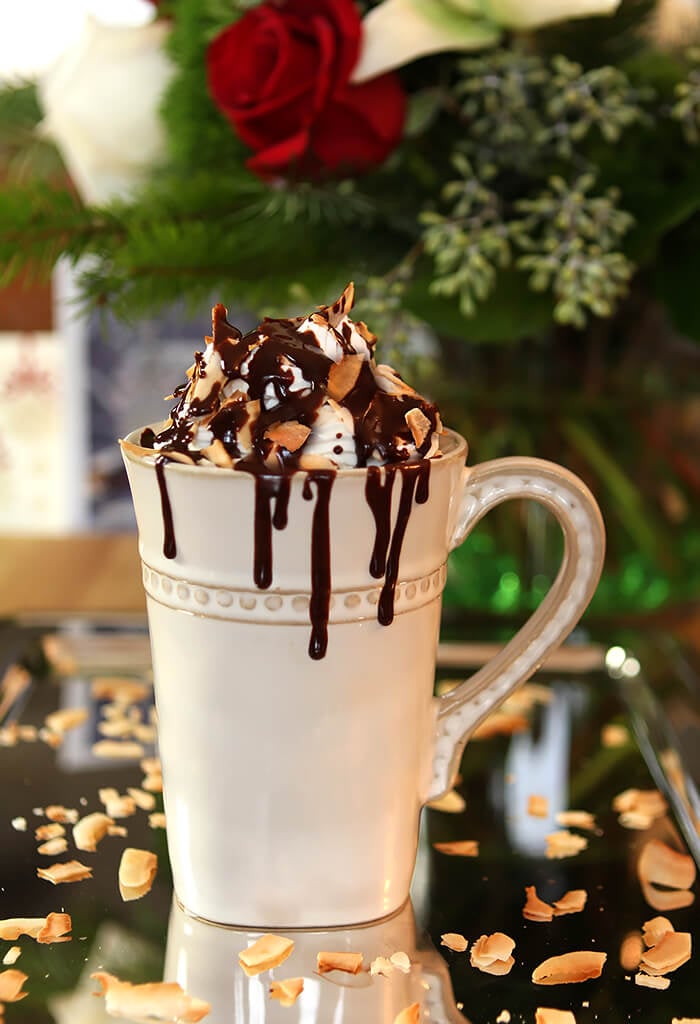 Hot Chocoate with Rum, Coconut, and Chocolate Sauce in a Cream Colored Mug