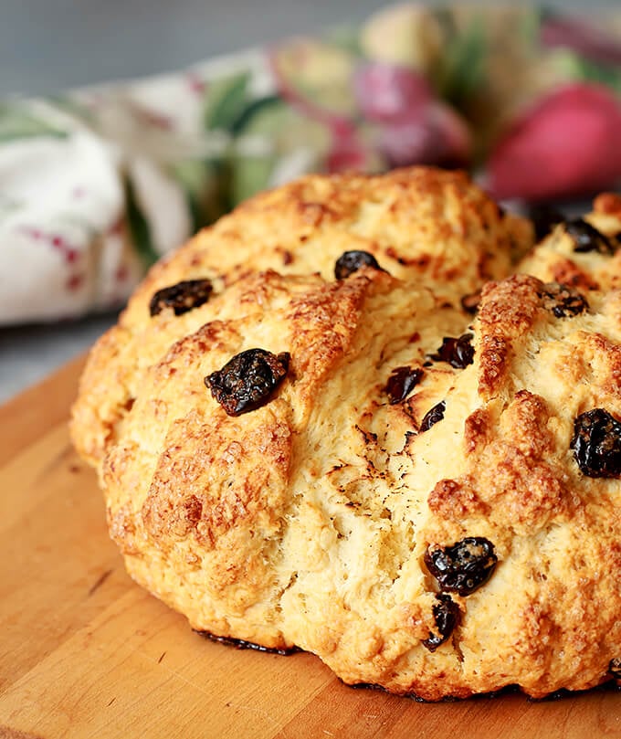 Irish Soda Bread with Tart Cherries Served on a Cutting Board