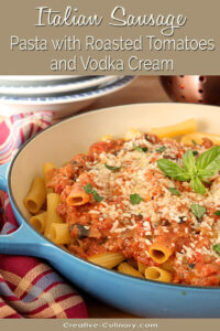 Italian Sausage Pasta with Roasted Tomatoes and Vodka Cream Served in Blue Skillet