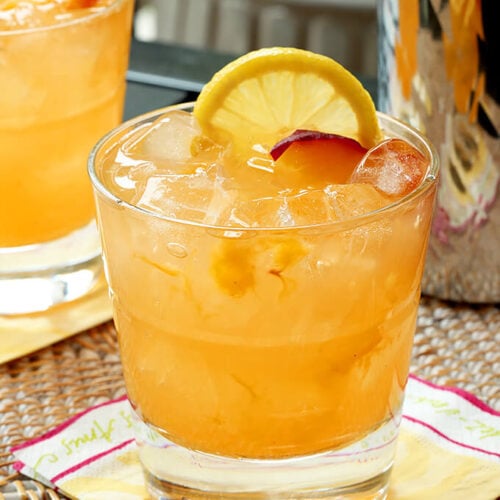 Kentucky Peach Cocktail In a Glass with an Up Close View