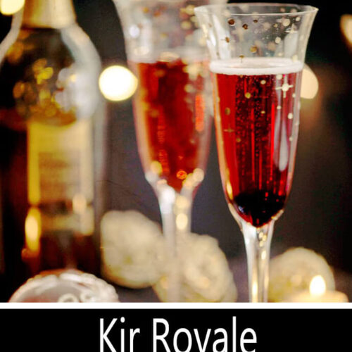 Kir Royale Champagne Cocktail Served in a Pair of Champagne Flutes