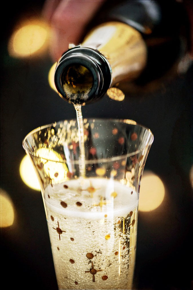 Kir Royale Champagne Cocktail as Champagne is Poured into Glass