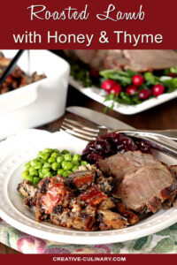 Roasted Lamb with Honey and Thyme and Rye/Pumpernickel Dressing on White Plate