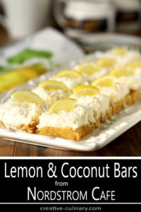 Lemon and Coconut Bars with Mascarpone Cheese from Nordstrom Cafe Garnished with Lemon Slices