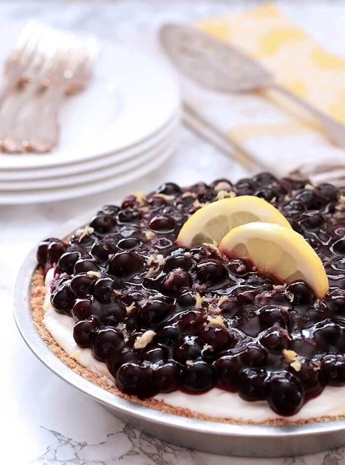 Lemon Cream Pie with Blueberries Whole with Lemon Slices for Garnish