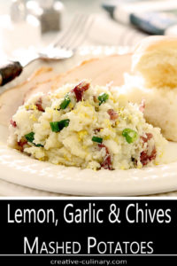 Lemon, Garlic, and Chives Mashed Potatoes Served on a Round White Plate